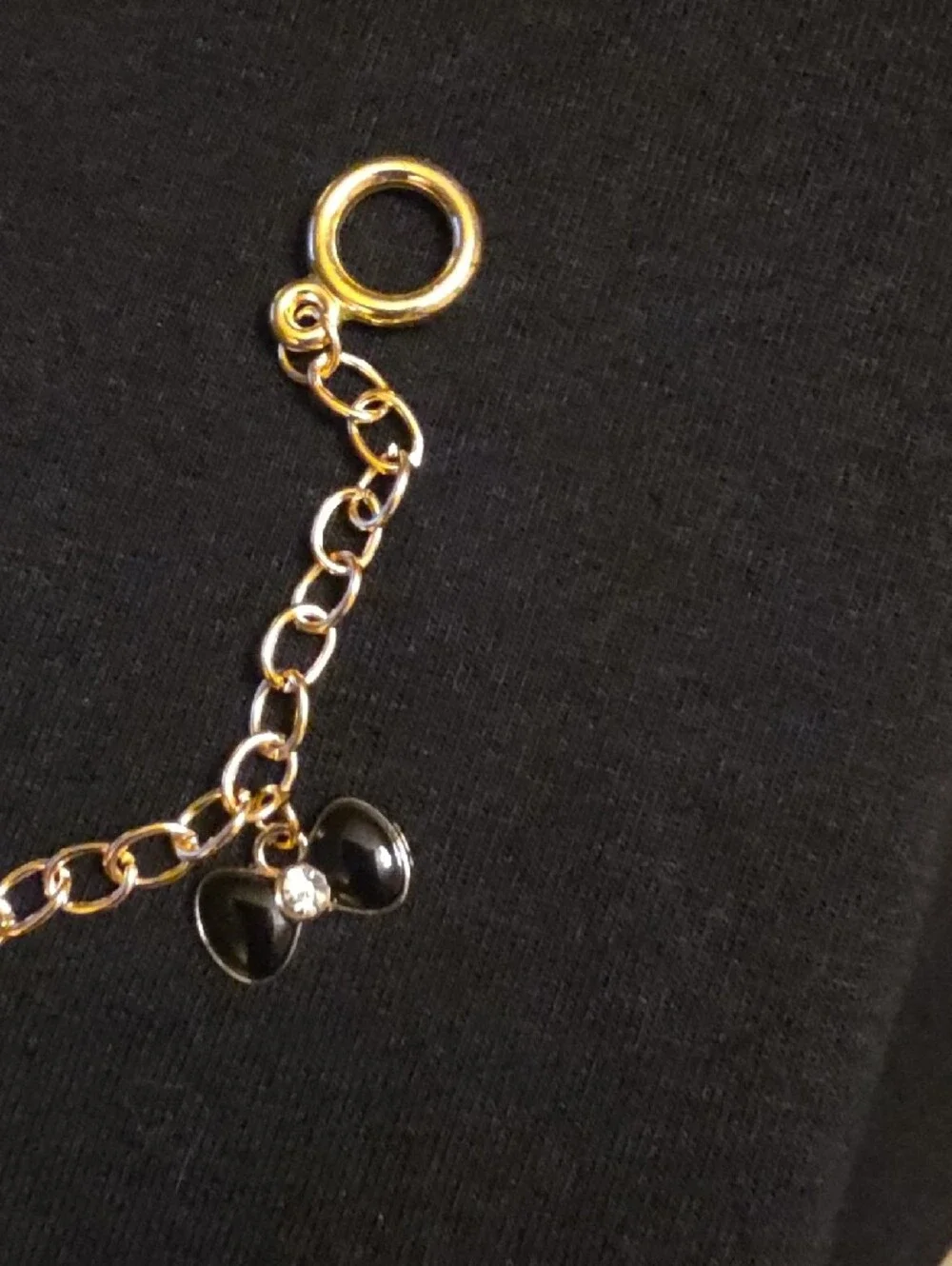 Gold-Tone Charm Bracelet with Purse, Bow and Coin Charms